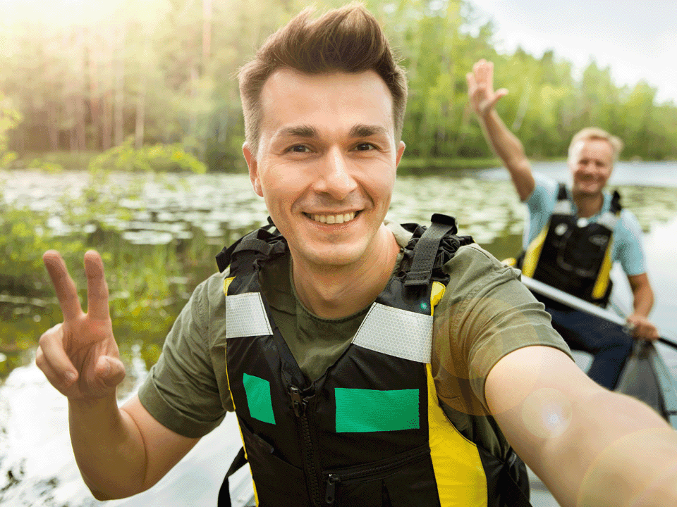 Two men are in a rowing boat.
